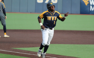 WVU Baseball player #1 rounding bases